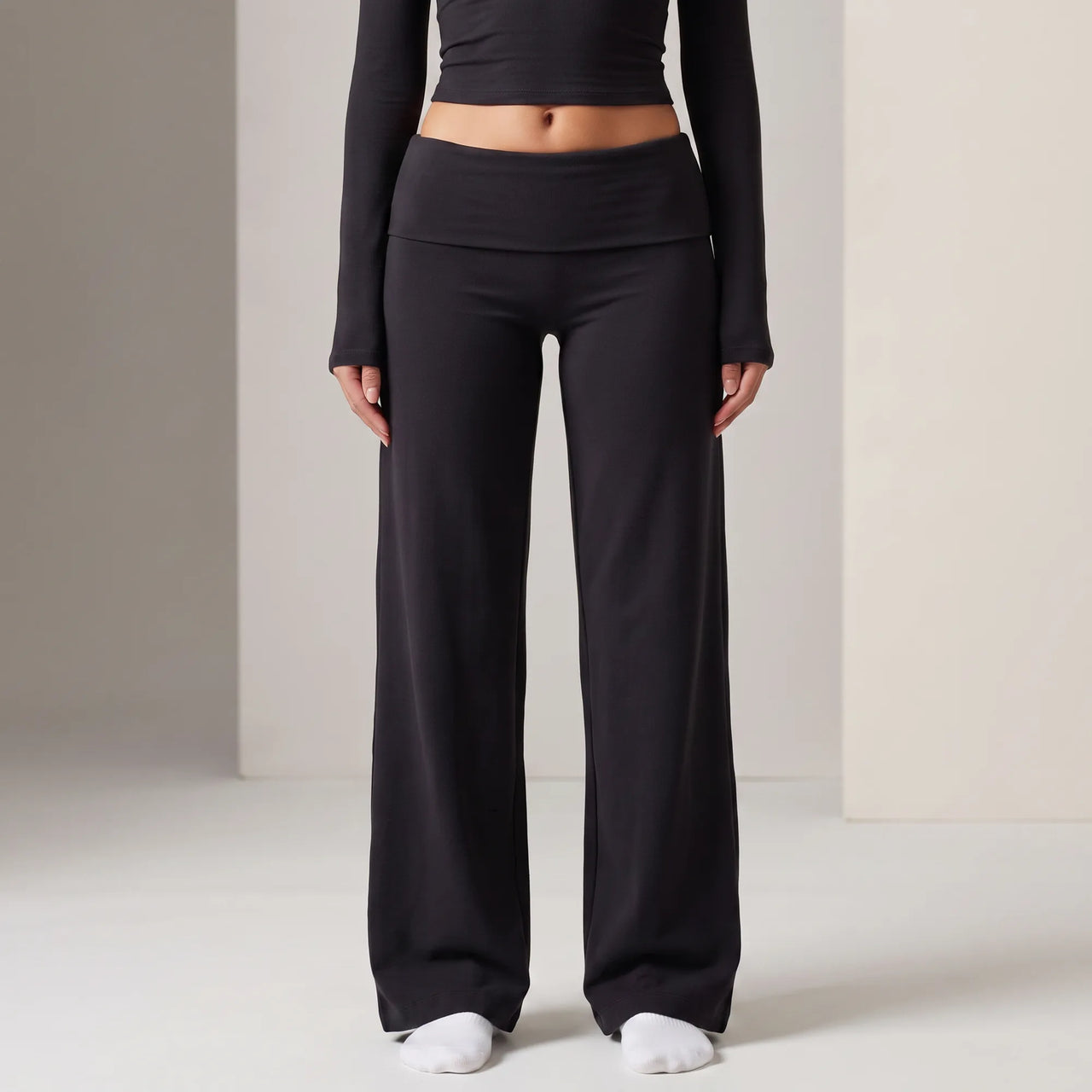 Black Calma high-waisted straight-leg trouser, foldover waistband detail