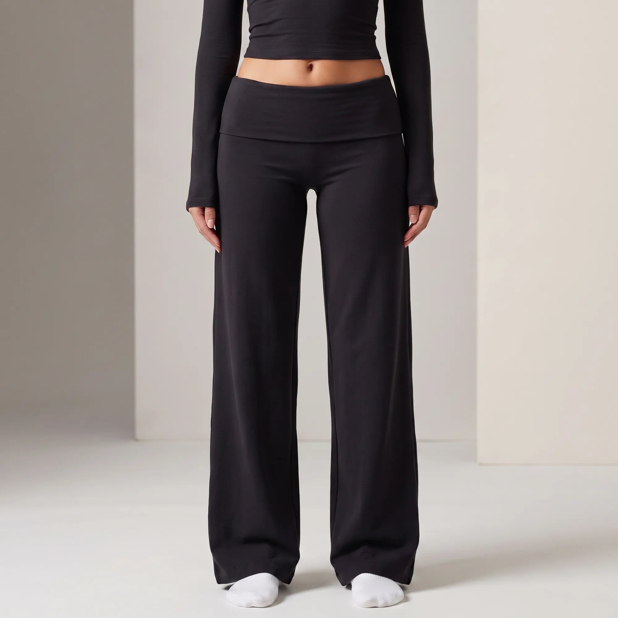 Black Calma high-waisted straight-leg trouser, foldover waistband detail