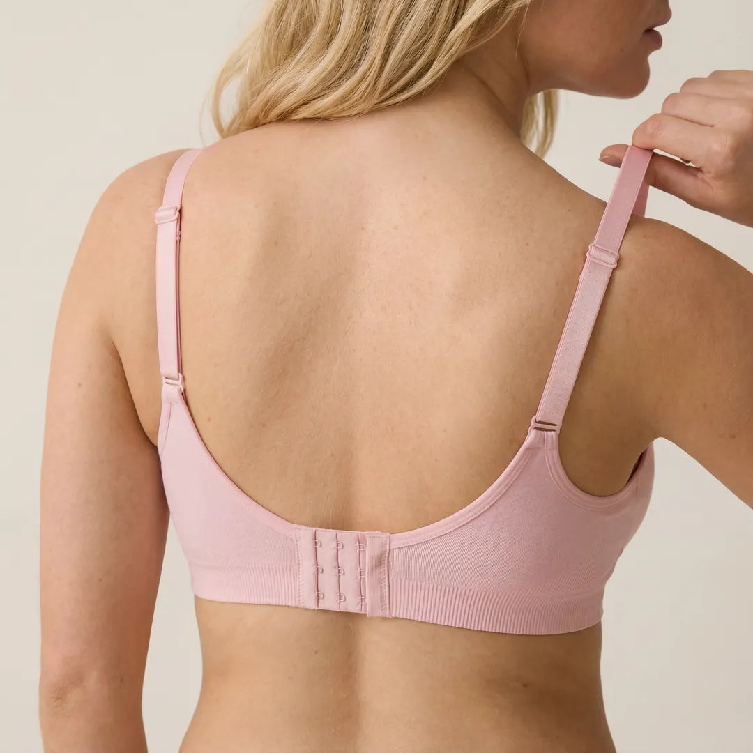 Pink classic nursing bra multi-hook back closure with adjustable straps, back view studio shot