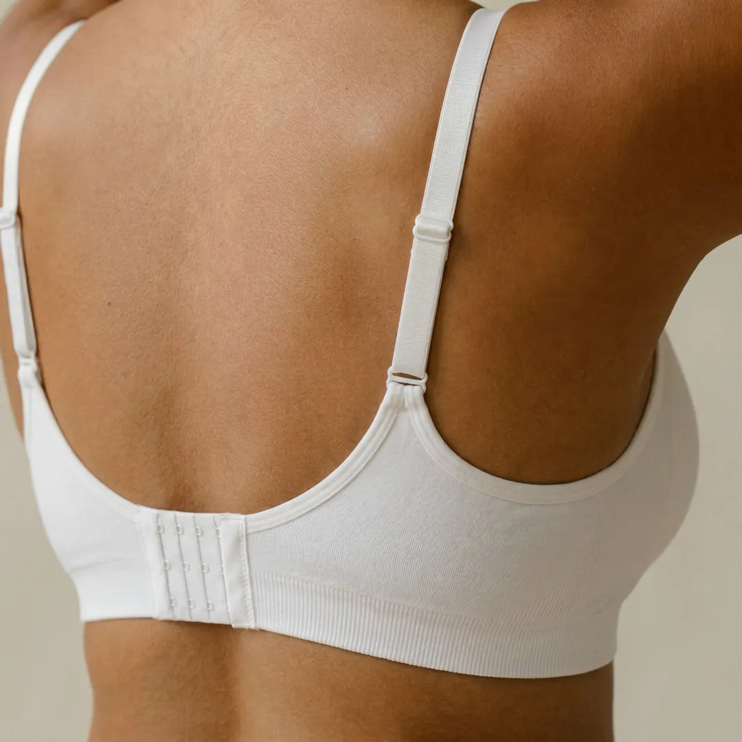 White classic nursing bra multi-hook back closure adjustable straps, back view close-up detail shot