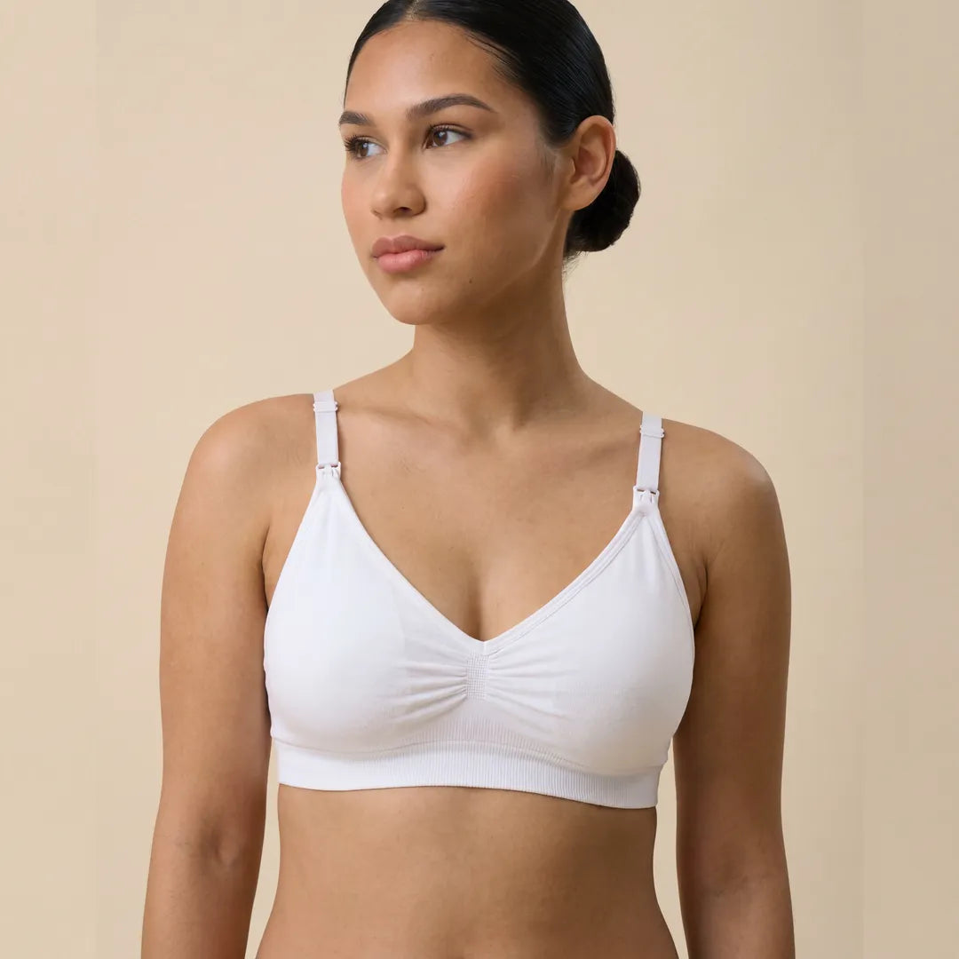 White classic nursing bra smooth gathered cup with drop-clip strap access, upper body studio portrait shot
