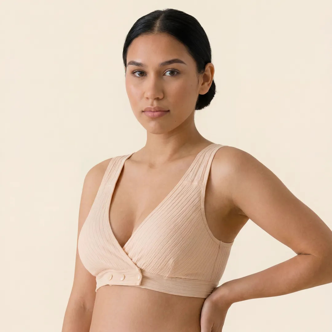 Nude nursing cotton bra ribbed crossover wrap front with snap closure, angled upper body studio shot