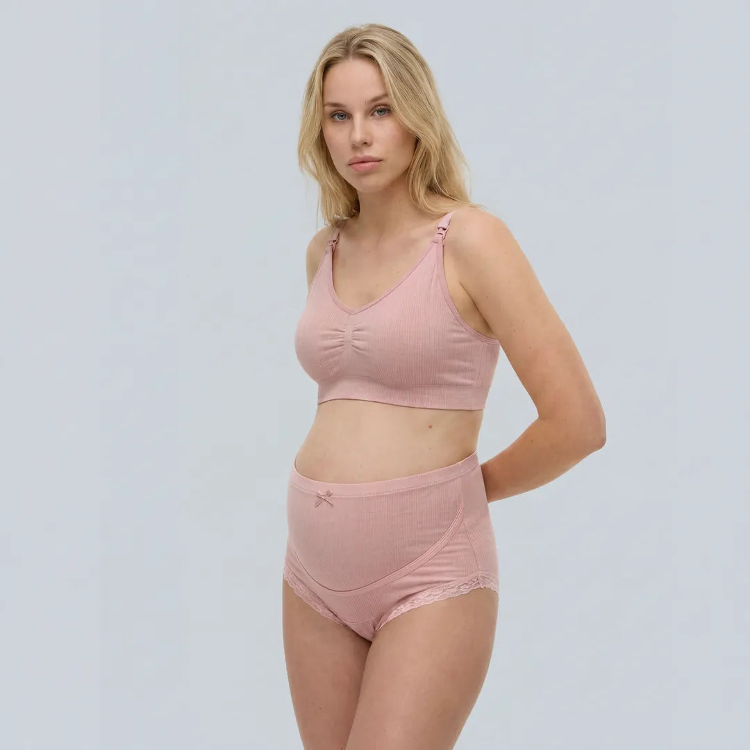 Pink maternity cotton brief lace trim belly support, pregnant model front view