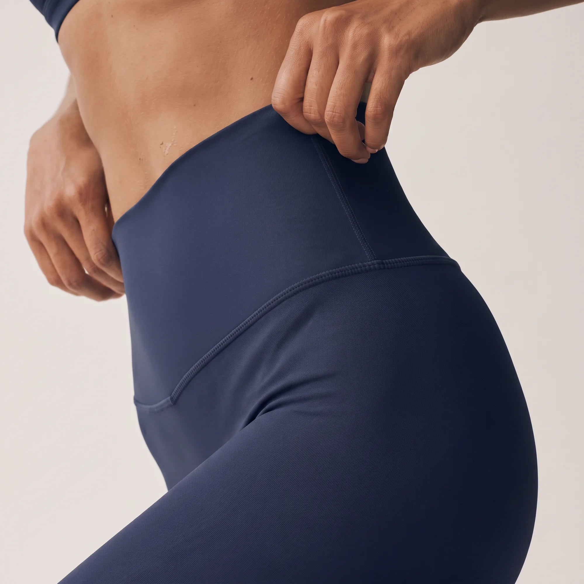 Navy Florecer high-waisted flare legging, high waistband detail