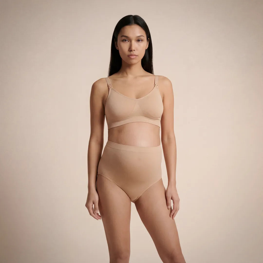 Beige maternity high waist brief over bump coverage, side view
