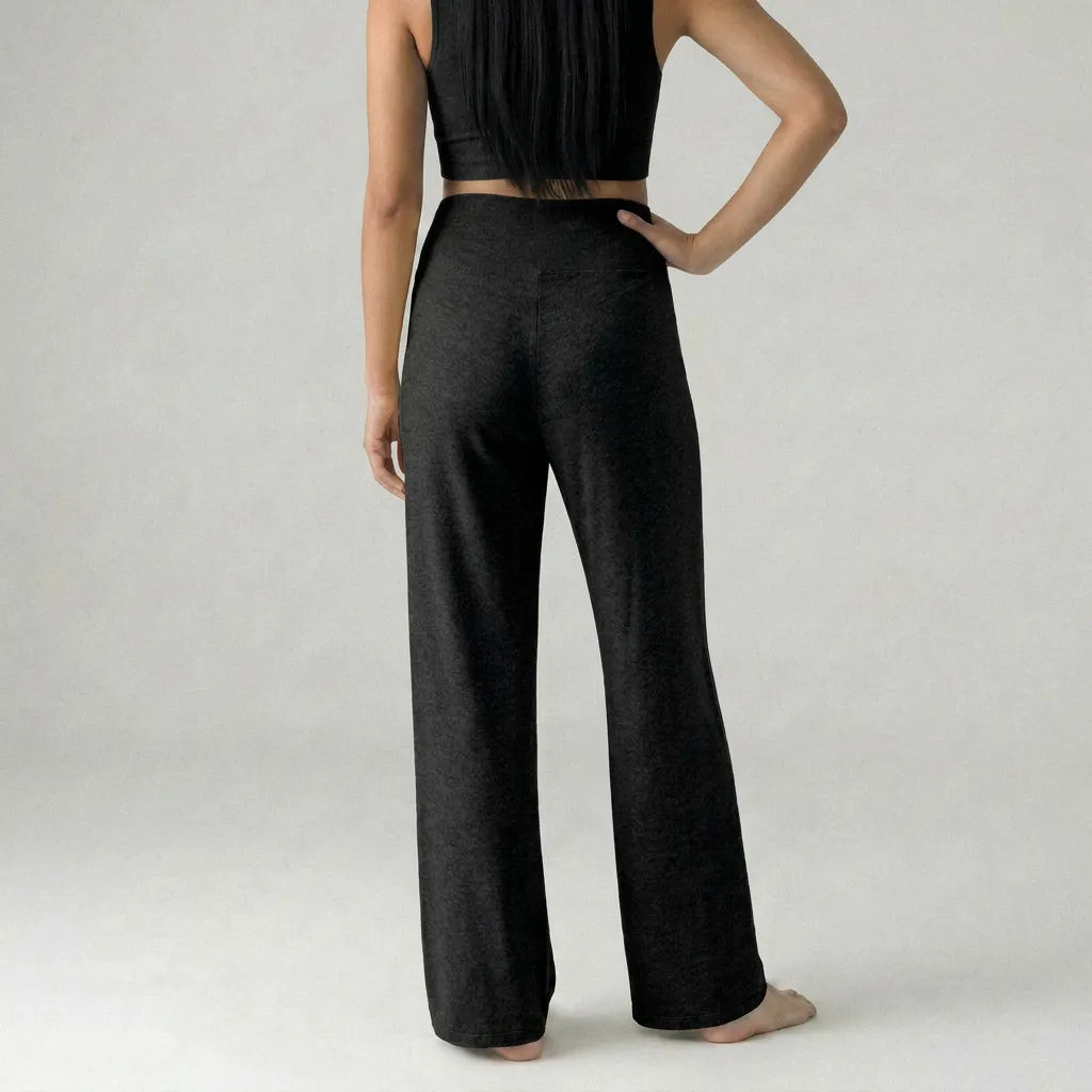 Black knit maternity trousers wide leg back view, full length