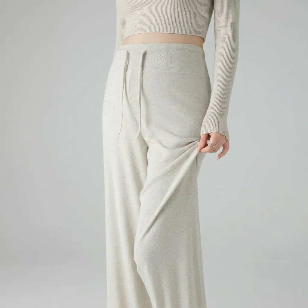 Tea white knit maternity trousers soft fabric stretch detail, close-up