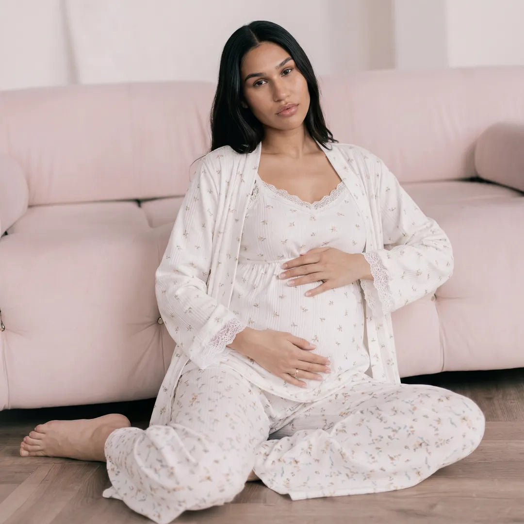 Floral maternity cotton lounge set ribbed robe cami and trousers, floor seated lifestyle shot