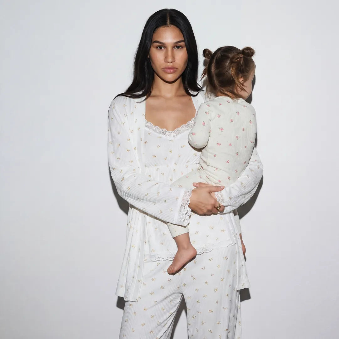 Floral maternity cotton lounge set lace trim robe and cami, postpartum lifestyle shot with child