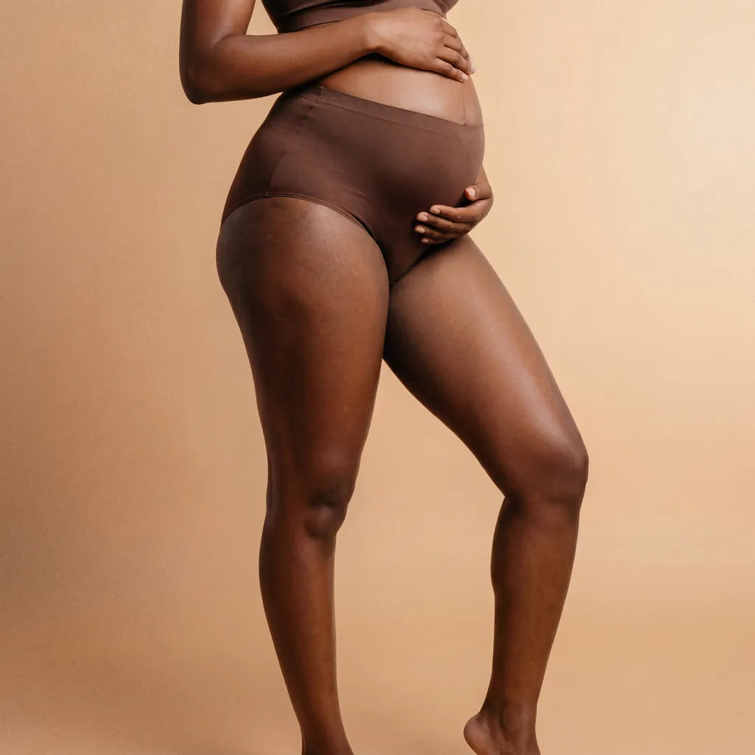 Chocolate maternity seamless brief high-rise belly support, pregnant model front view