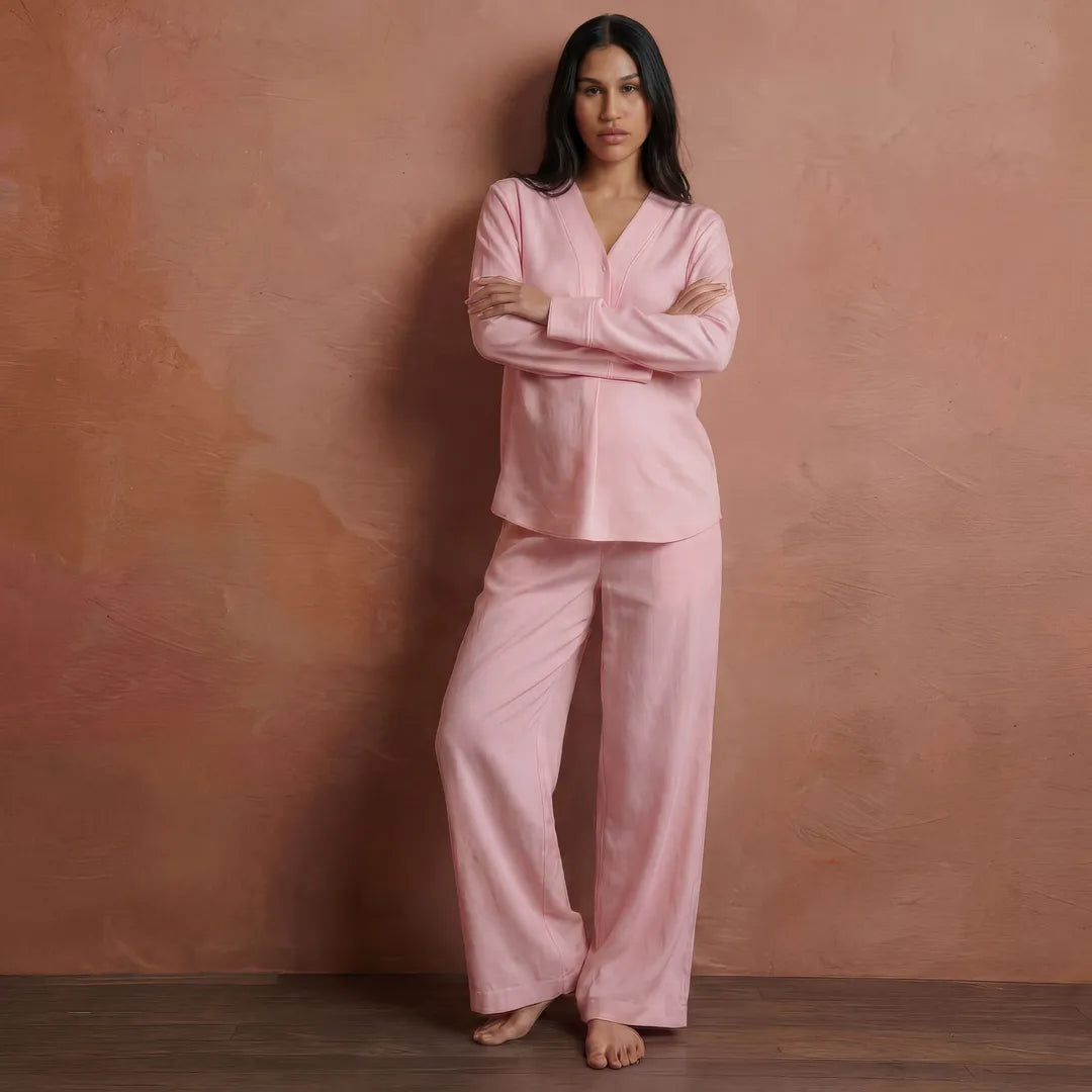 Pink maternity nursing pyjama set long sleeve relaxed fit, full length leaning front view