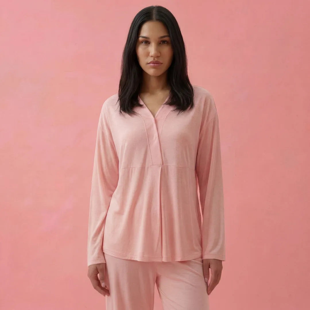 Pink maternity nursing pyjama set V-neck button top detail, upper body close-up crop