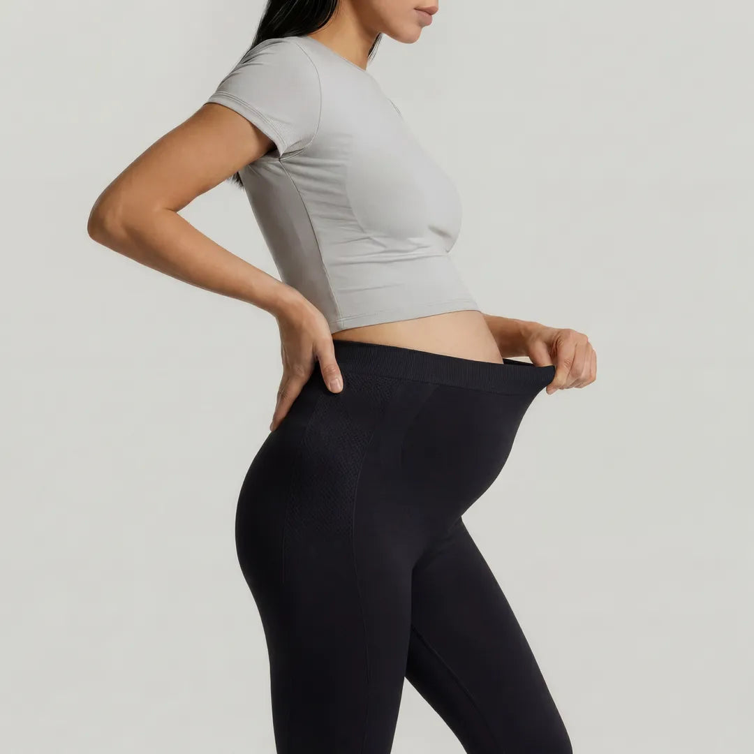 Black maternity seamless leggings expandable belly panel, side waistband stretch detail