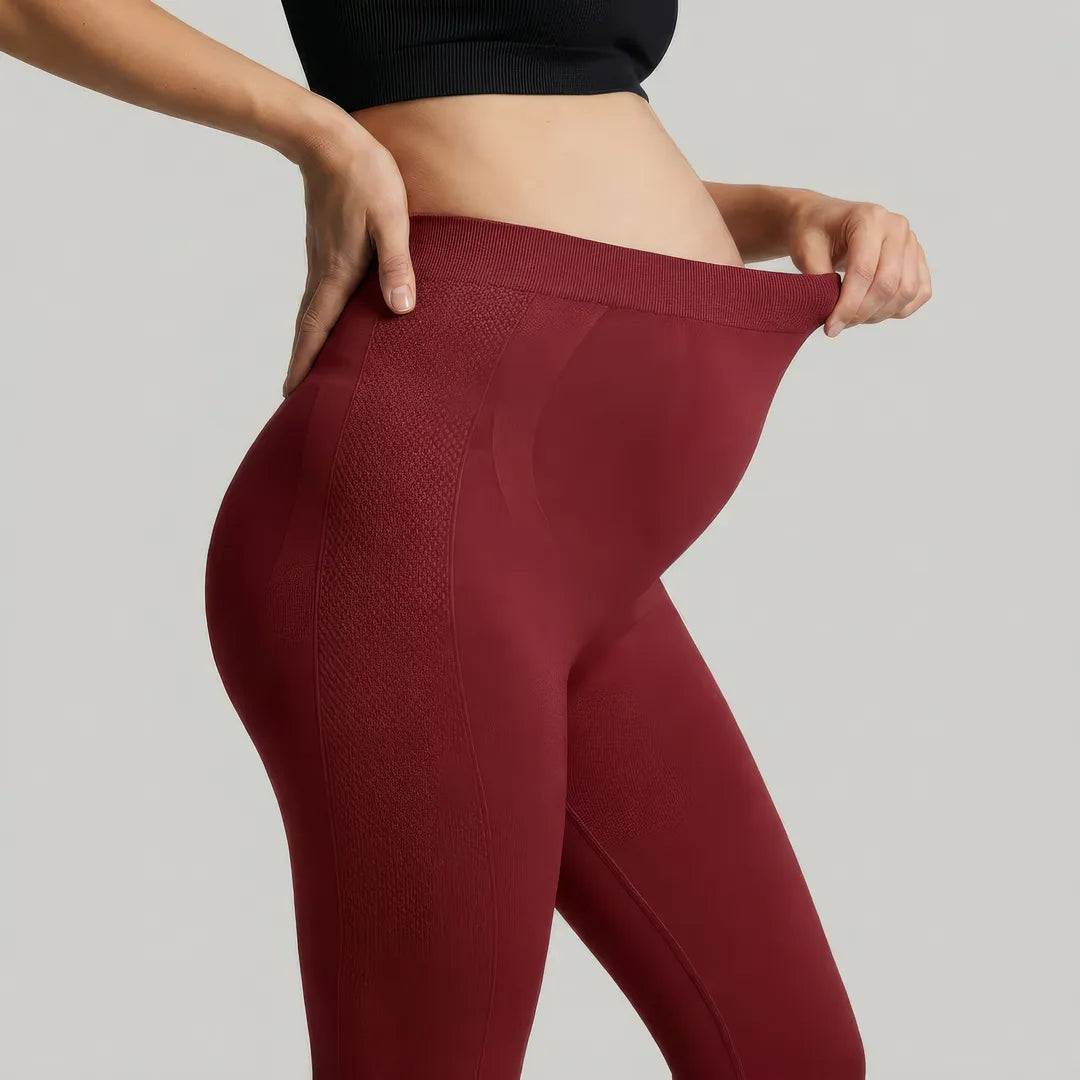 Burgundy maternity seamless leggings expandable over-belly panel, close-up waistband stretch