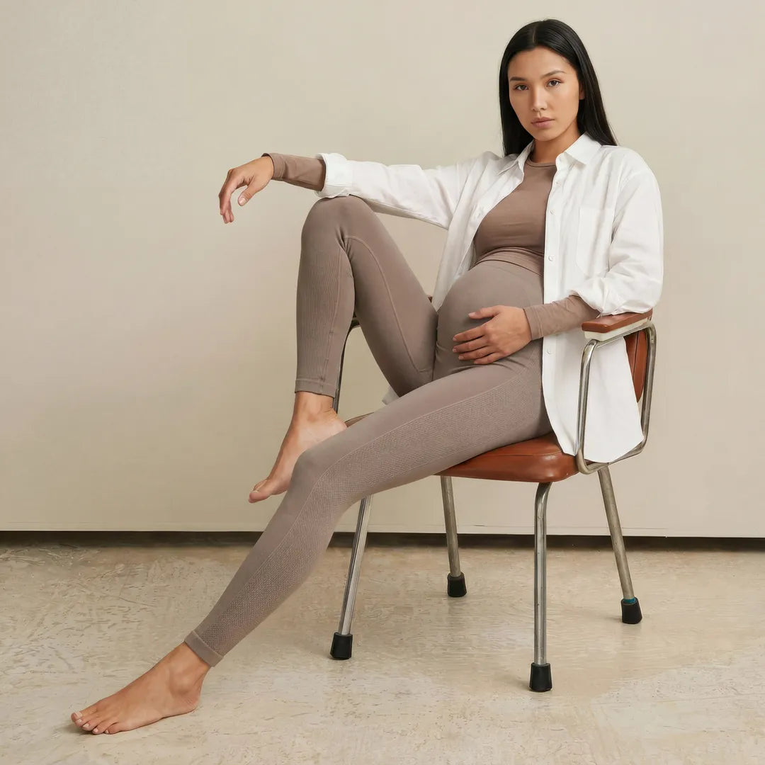 Taupe maternity seamless leggings full length support, seated editorial shot