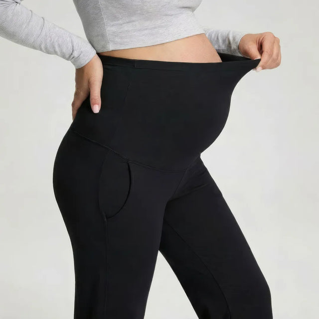 Black wide maternity trousers over-bump waist panel, stretch detail