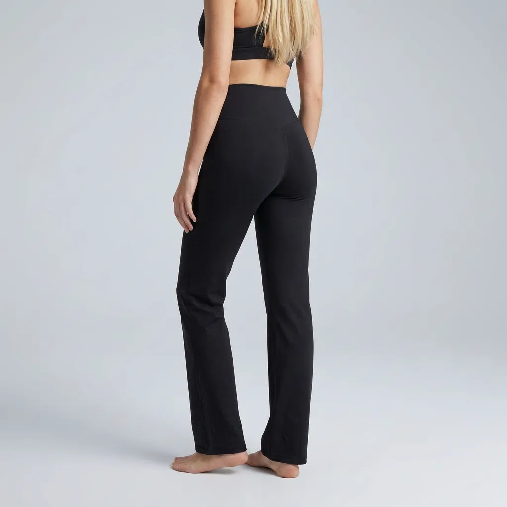 Black seamless yoga trousers back view, full length