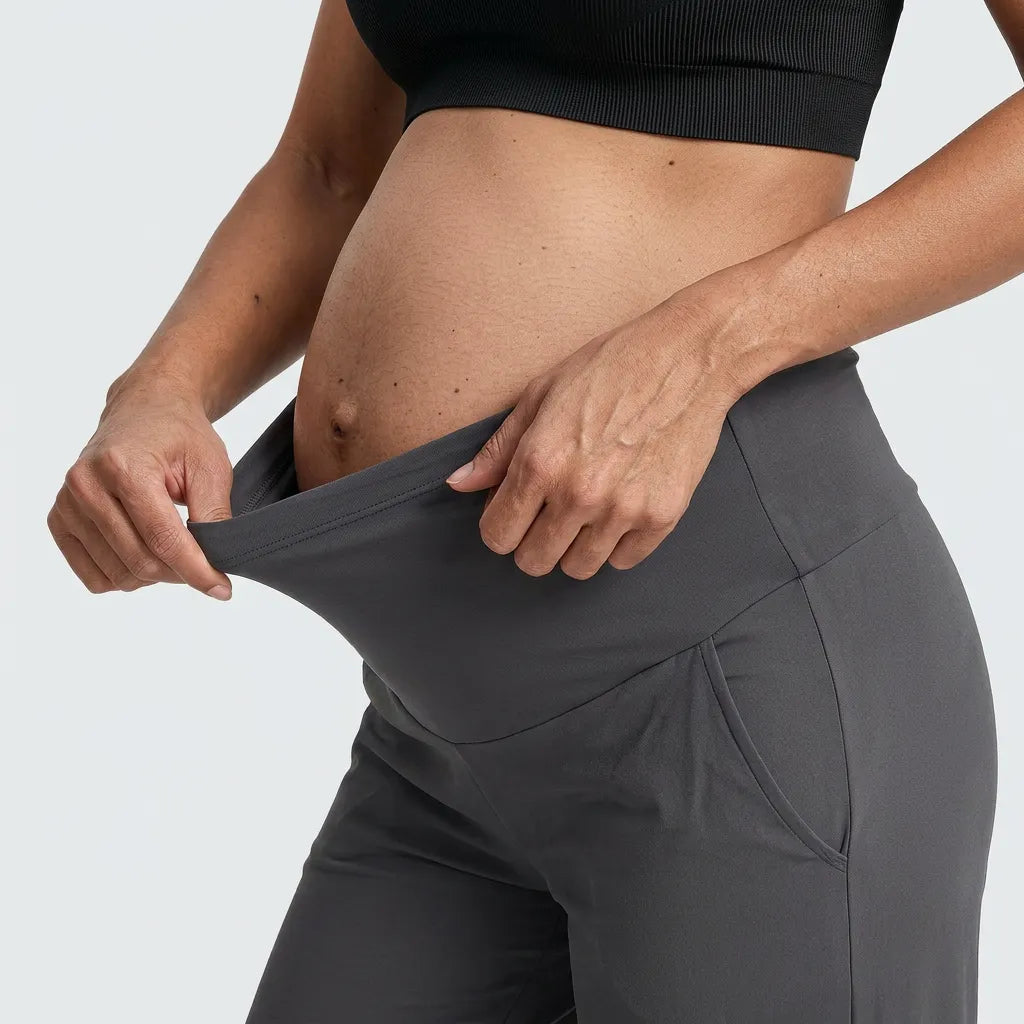 Charcoal seamless yoga trousers over-bump waist panel stretch detail